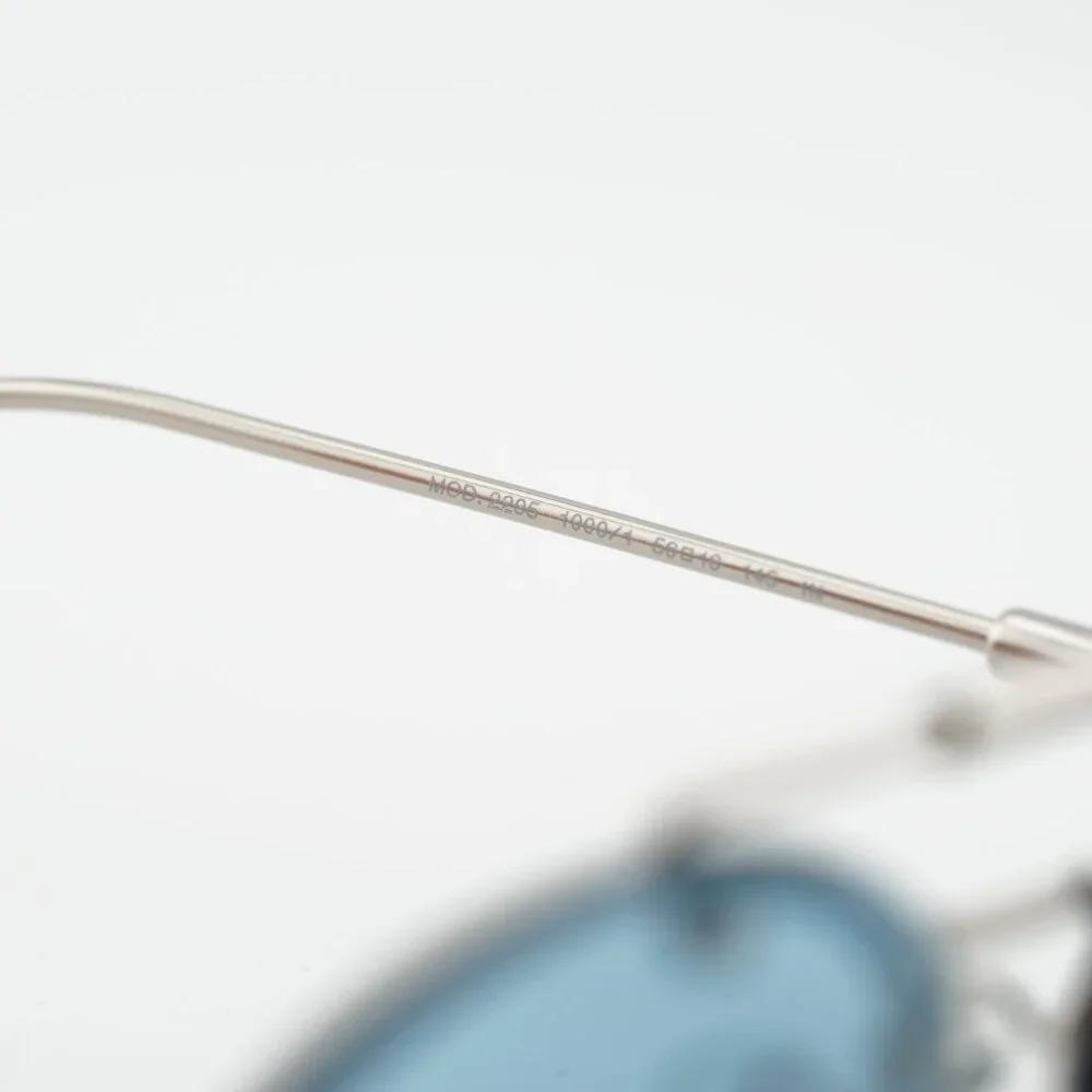 Versace VE2295 1000/1 Sunglasses Silver Oval Frame, Light Blue Lenses